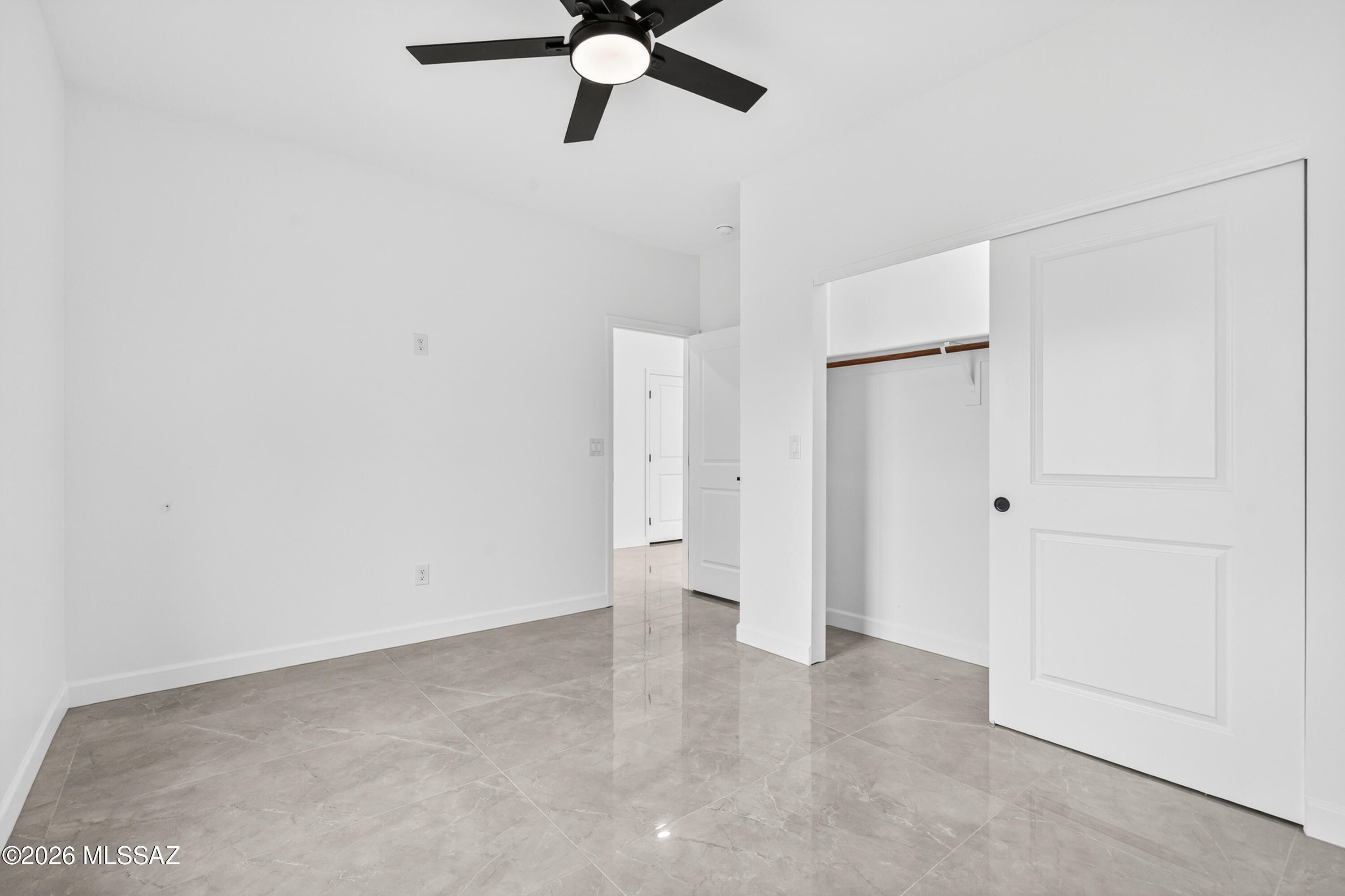 1834 Circulo Glorieta Rio Rico, AZ 85648 - Photo 23 of 35 wooden floor in an empty room