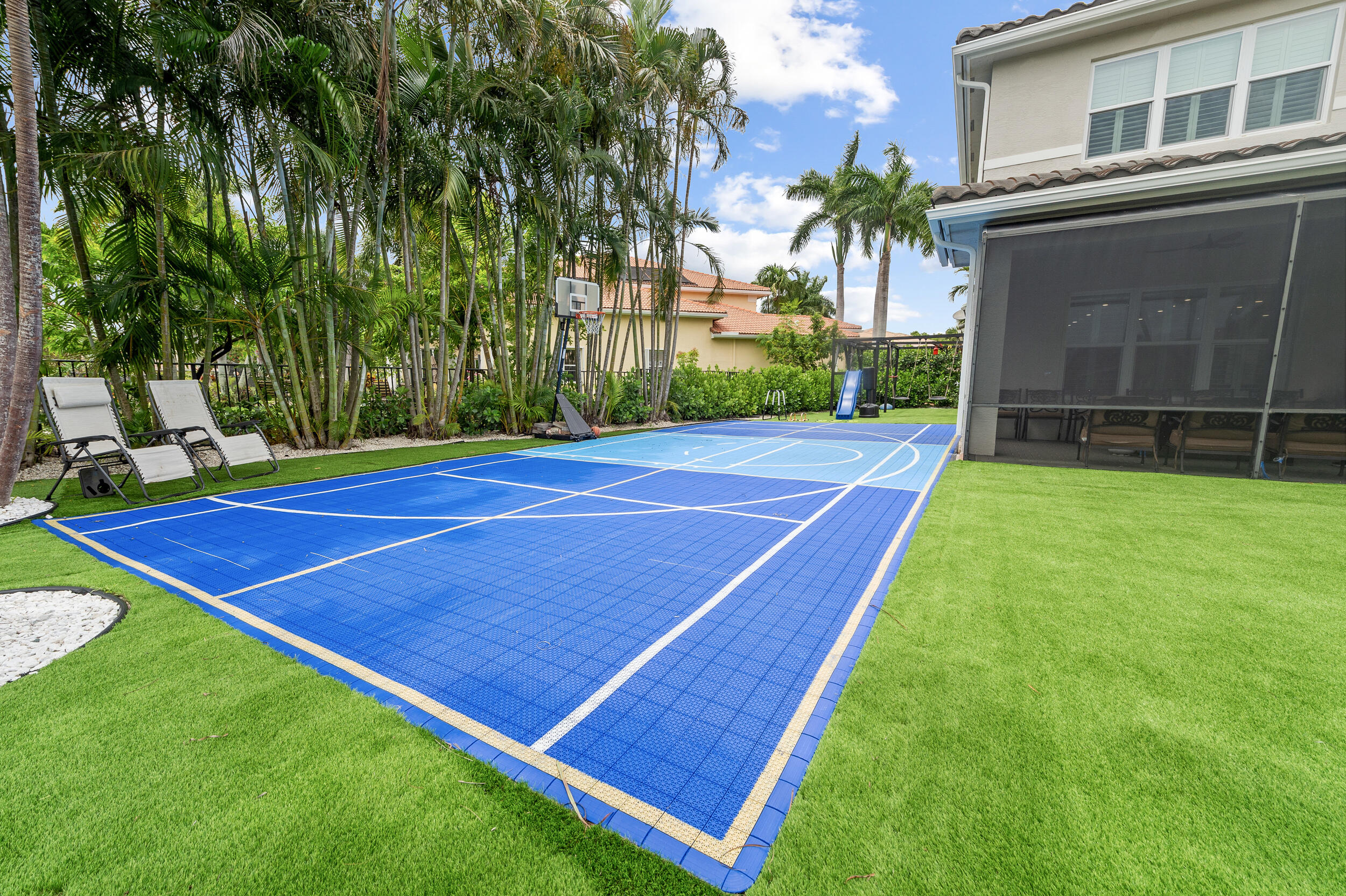 8680 Daystar Ridge Point Boynton Beach, FL 33473 - Photo 4 of 25 a view of an outdoor space and basketball court