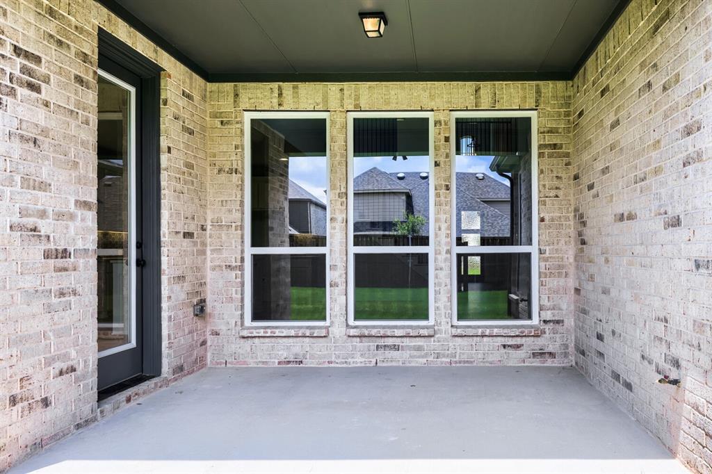 4414 Windy Point Road Oak Point, TX 75068 - Photo 27 of 27 a view of front door of house