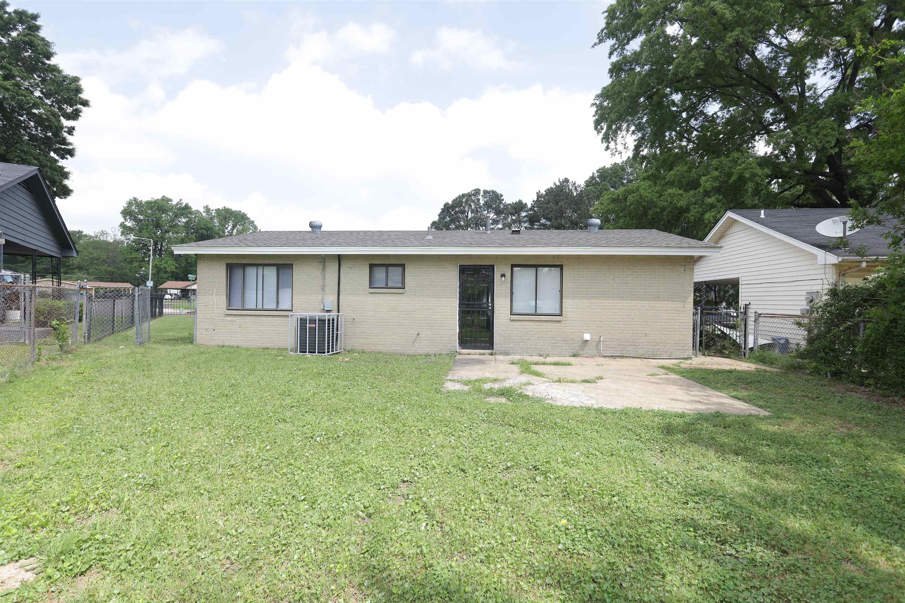 5142 Fairley Road Memphis, TN 38109 - Photo 3 of 13 a view of a house with backyard and garden
