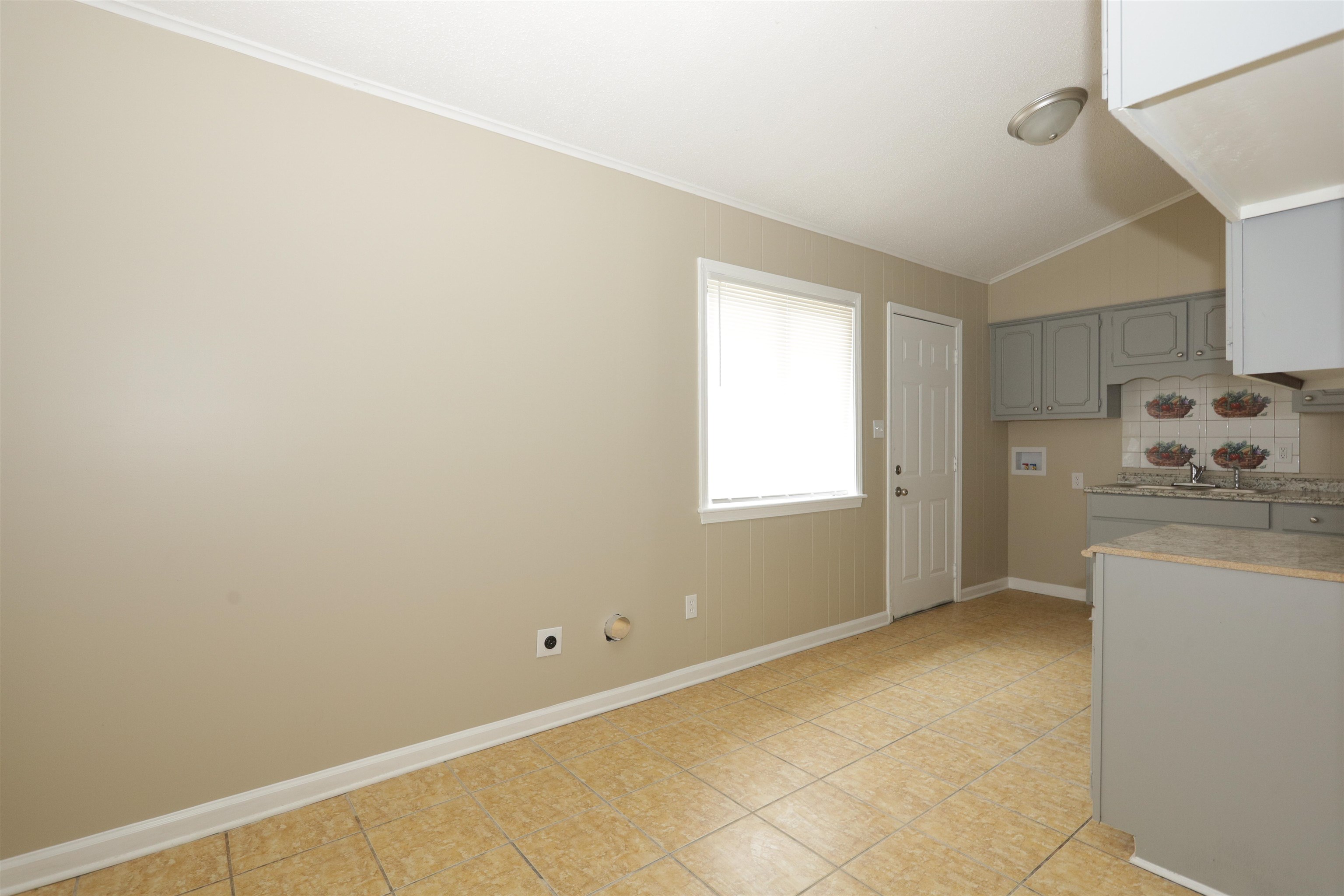 5142 Fairley Road Memphis, TN 38109 - Photo 6 of 13 a view of a kitchen with window
