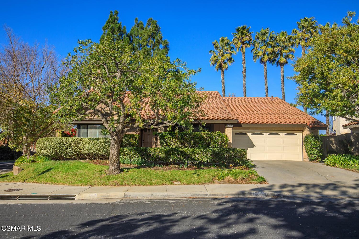 12617 Crystal Ranch Road Moorpark, CA 93021 - Photo 1 of 34 a front view of a house with a yard