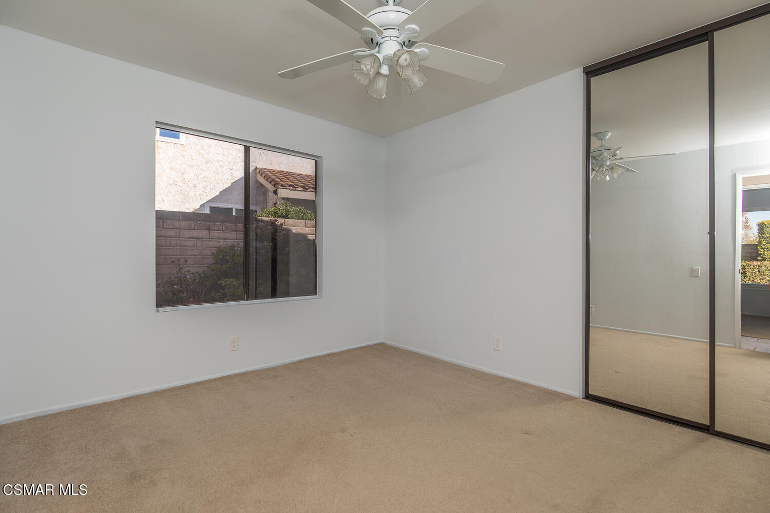 12617 Crystal Ranch Road Moorpark, CA 93021 - Photo 26 of 34 an empty room with windows and closet