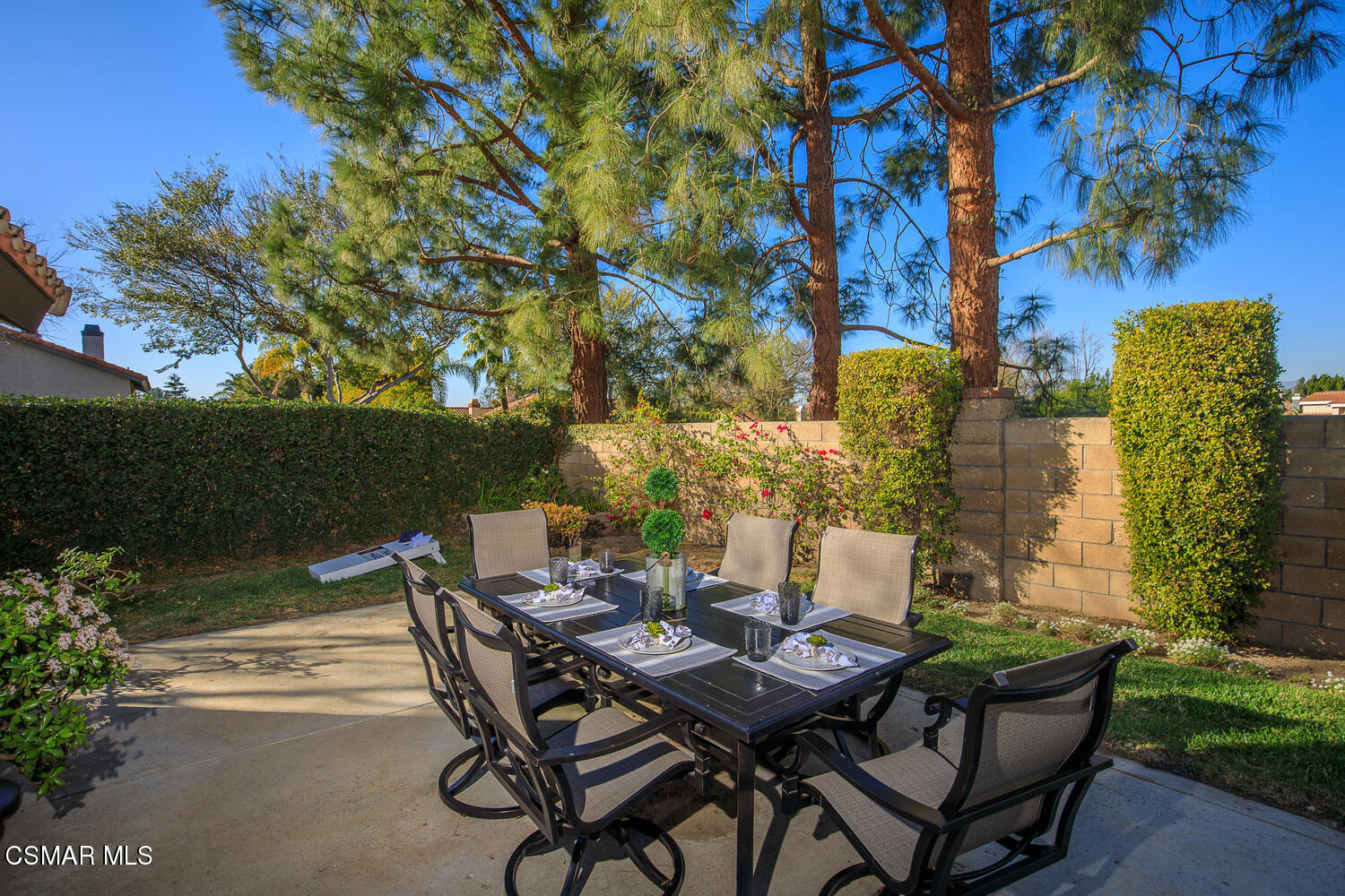 12617 Crystal Ranch Road Moorpark, CA 93021 - Photo 30 of 34 a view of a backyard with table and chairs