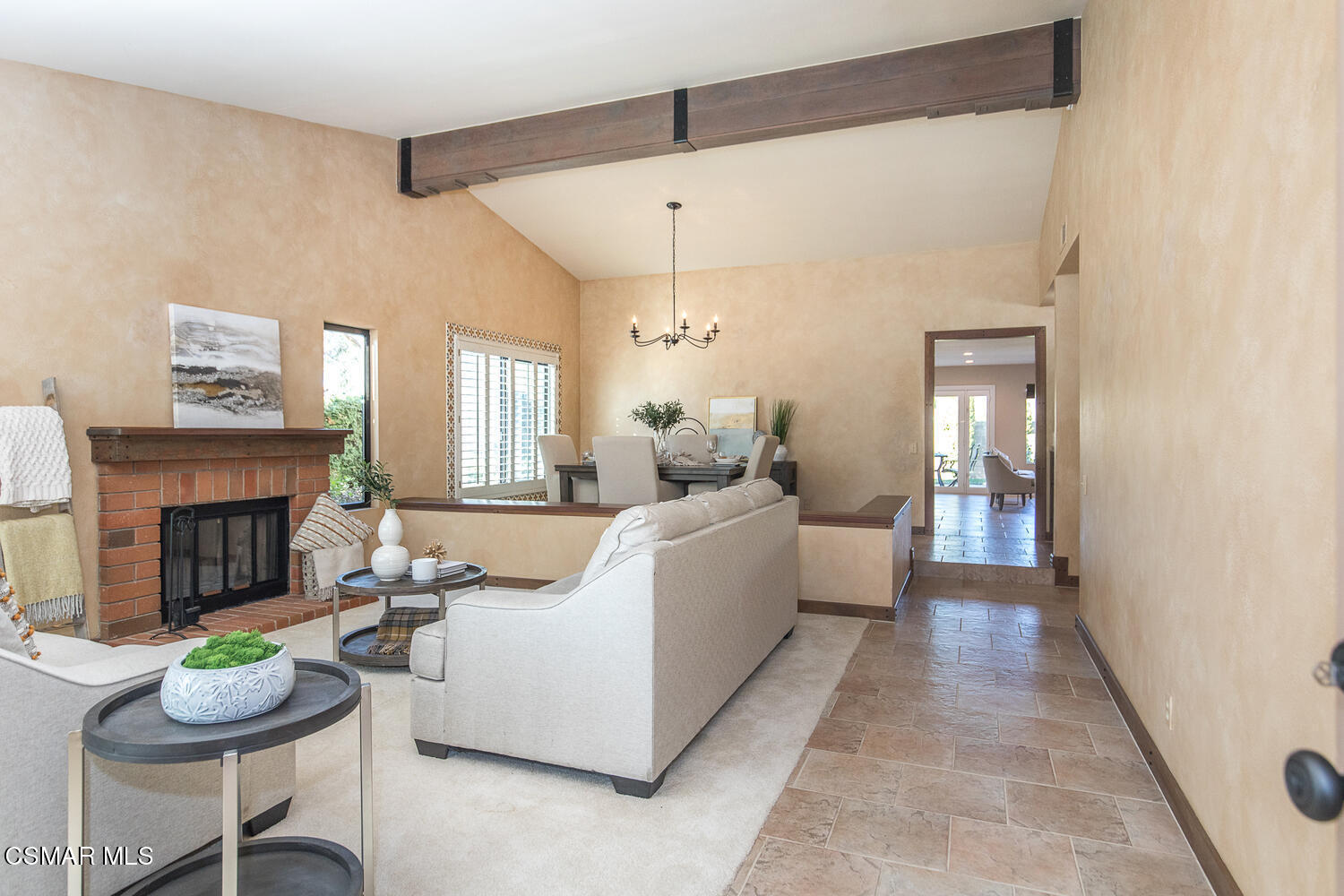 12617 Crystal Ranch Road Moorpark, CA 93021 - Photo 4 of 34 a living room with furniture and a fireplace