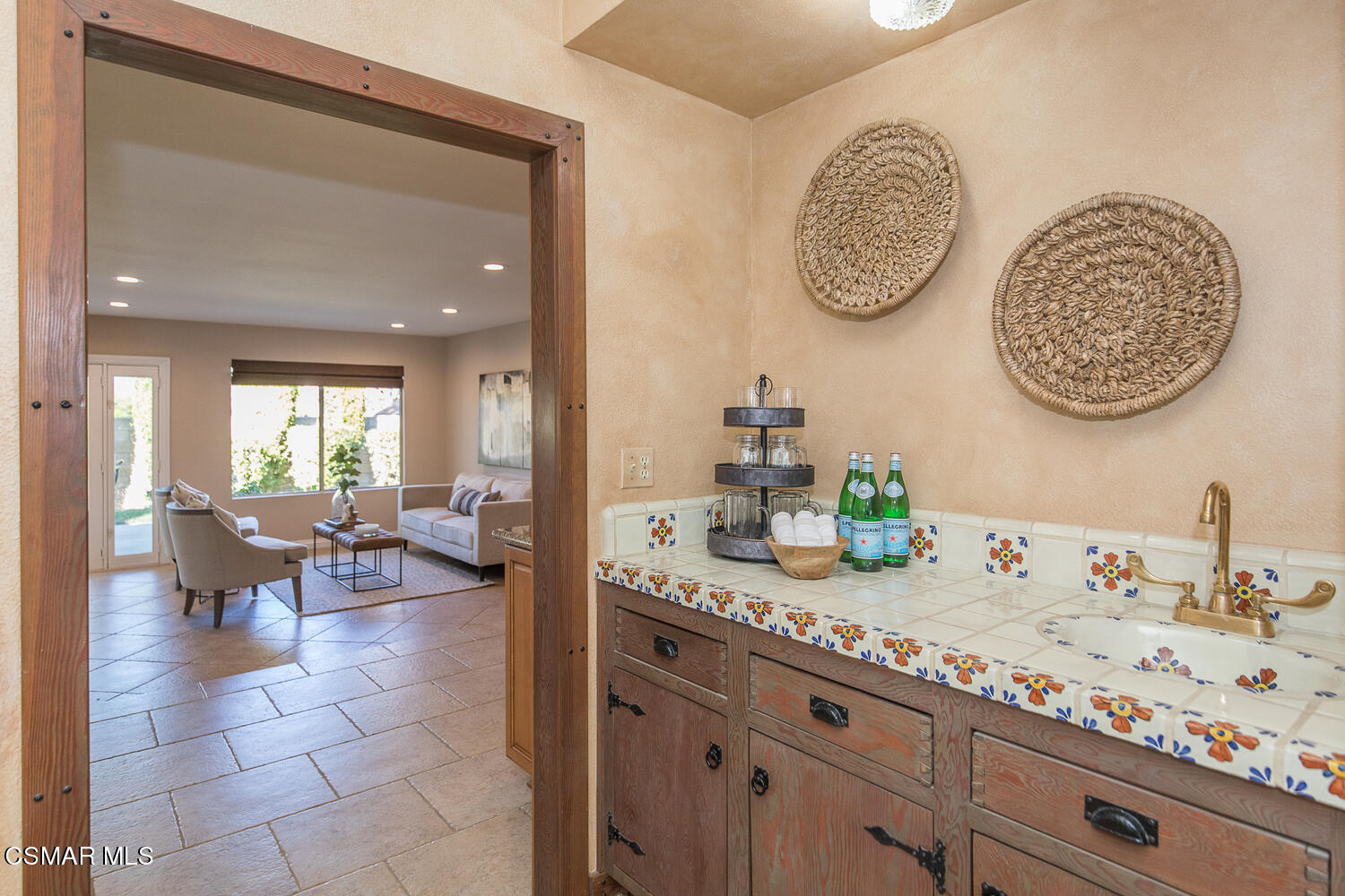 12617 Crystal Ranch Road Moorpark, CA 93021 - Photo 7 of 34 a view of a kitchen area with granite countertop lots of clutter and cabinets