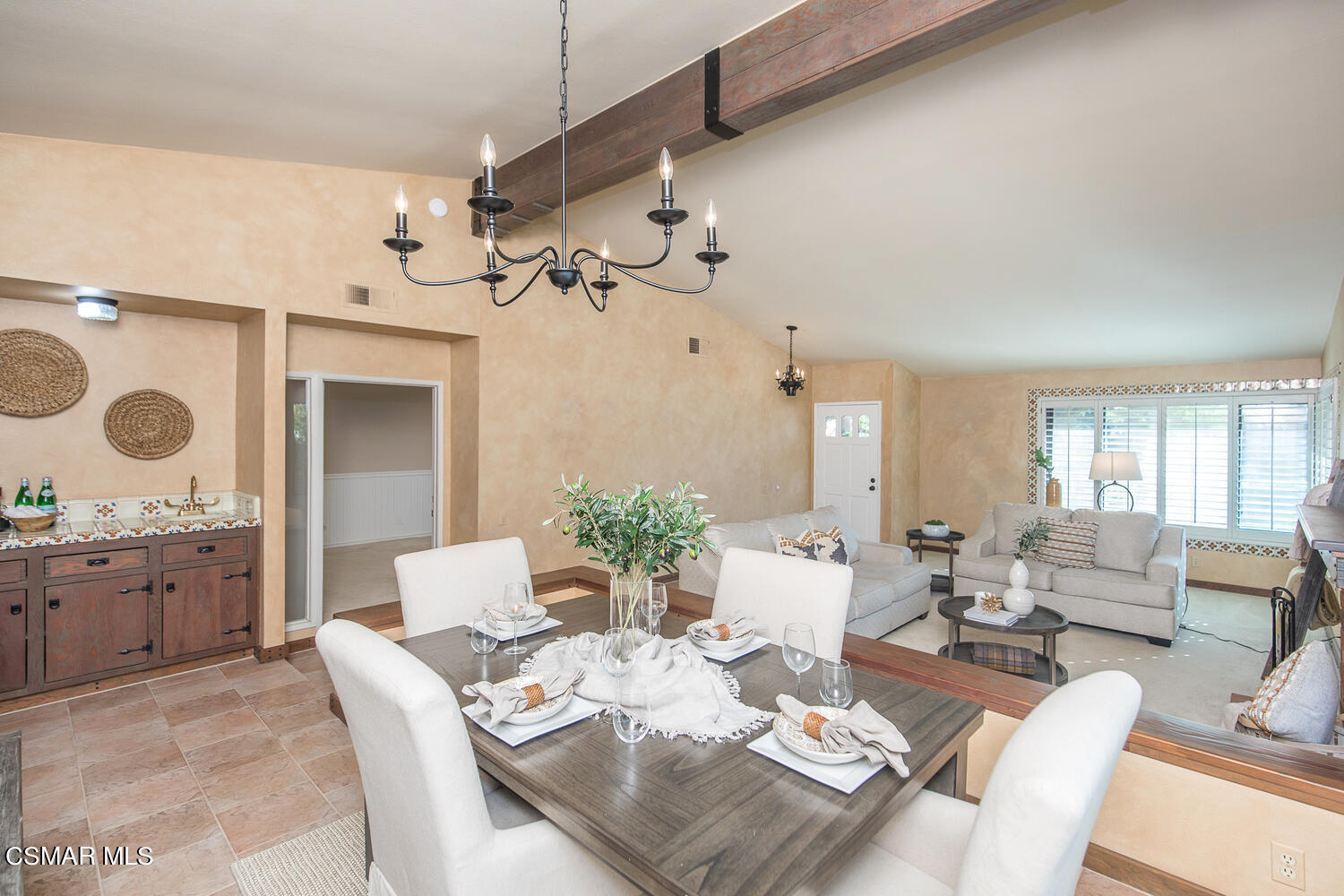 12617 Crystal Ranch Road Moorpark, CA 93021 - Photo 9 of 34 a dining room with furniture a chandelier and wooden floor