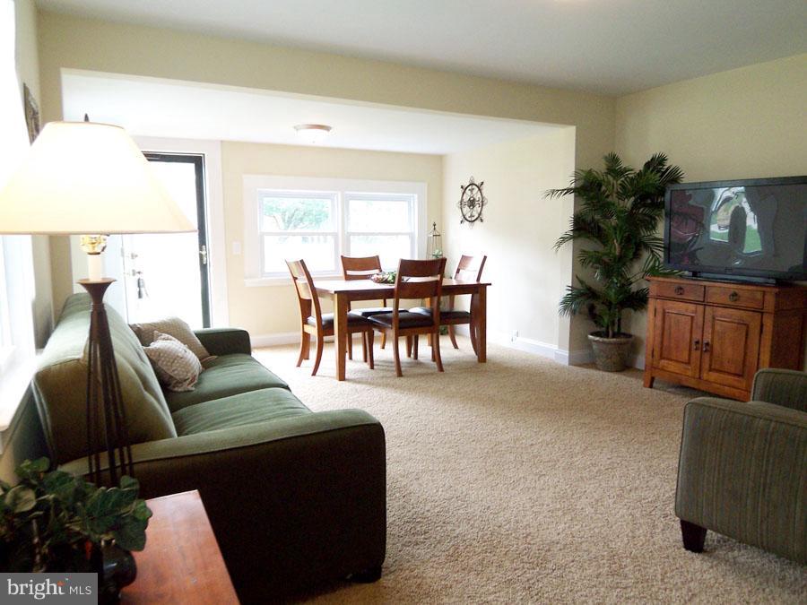 228 Carvel Road Pasadena, MD 21122 - Photo 3 of 20 Living Room Introducing Neutral Paint and Carpet