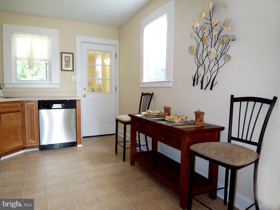 228 Carvel Road Pasadena, MD 21122 - Photo 6 of 20 Space for Casual Dining Table . Access to Yard