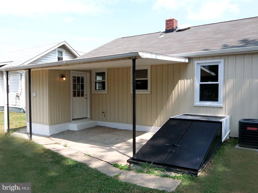 228 Carvel Road Pasadena, MD 21122 - Photo 7 of 20 Mudroom . Covered Patio for Picnics and Grilling!