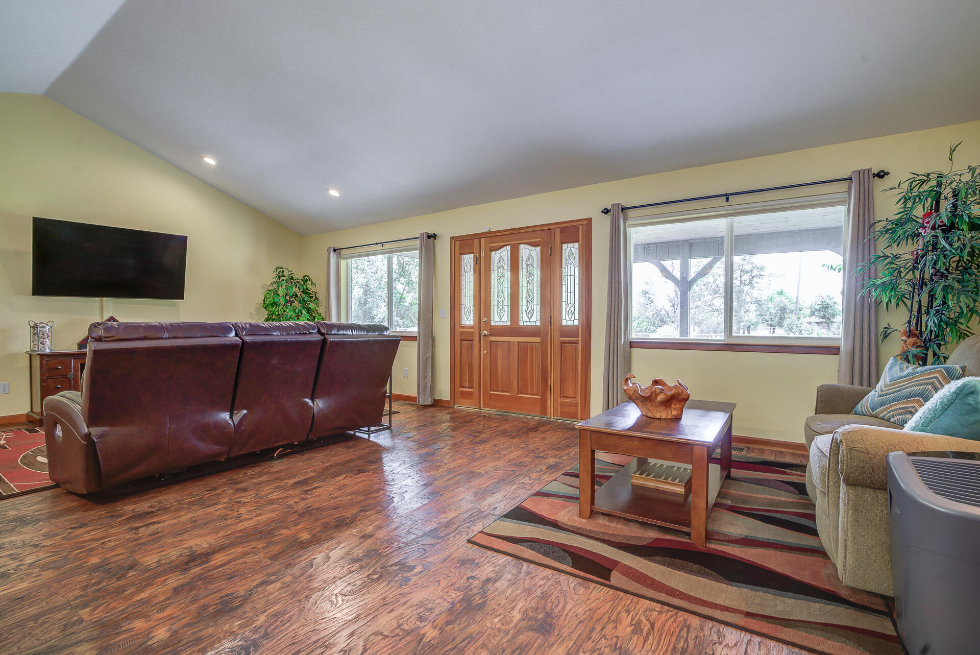 17536 Oly Way Anderson, CA 96007 - Photo 9 of 51 a living room with furniture and a flat screen tv