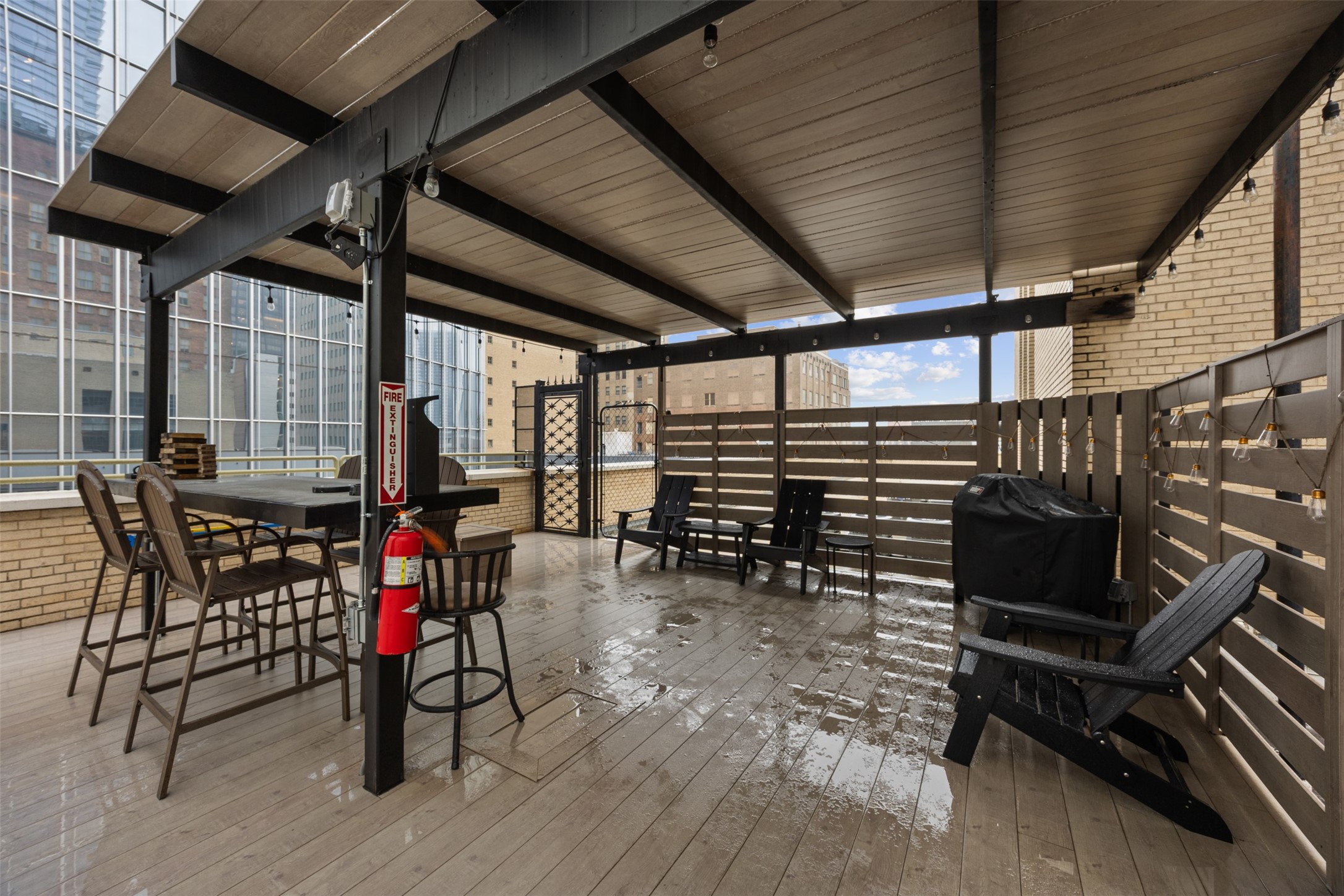 705 Main Street, Unit 513 Houston, TX 77002 - Photo 12 of 22 a view of a chairs and table in the patio