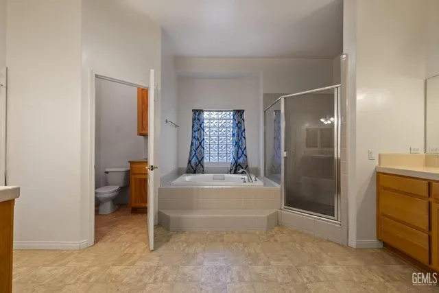 a bathroom with a bathtub sink and toilet