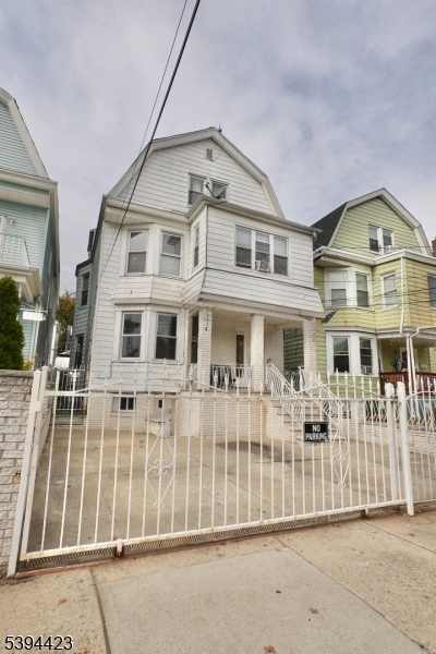 282 Woodside Avenue, Unit 1 Newark, NJ 07104 - Photo 17 of 18 a view of a large white building
