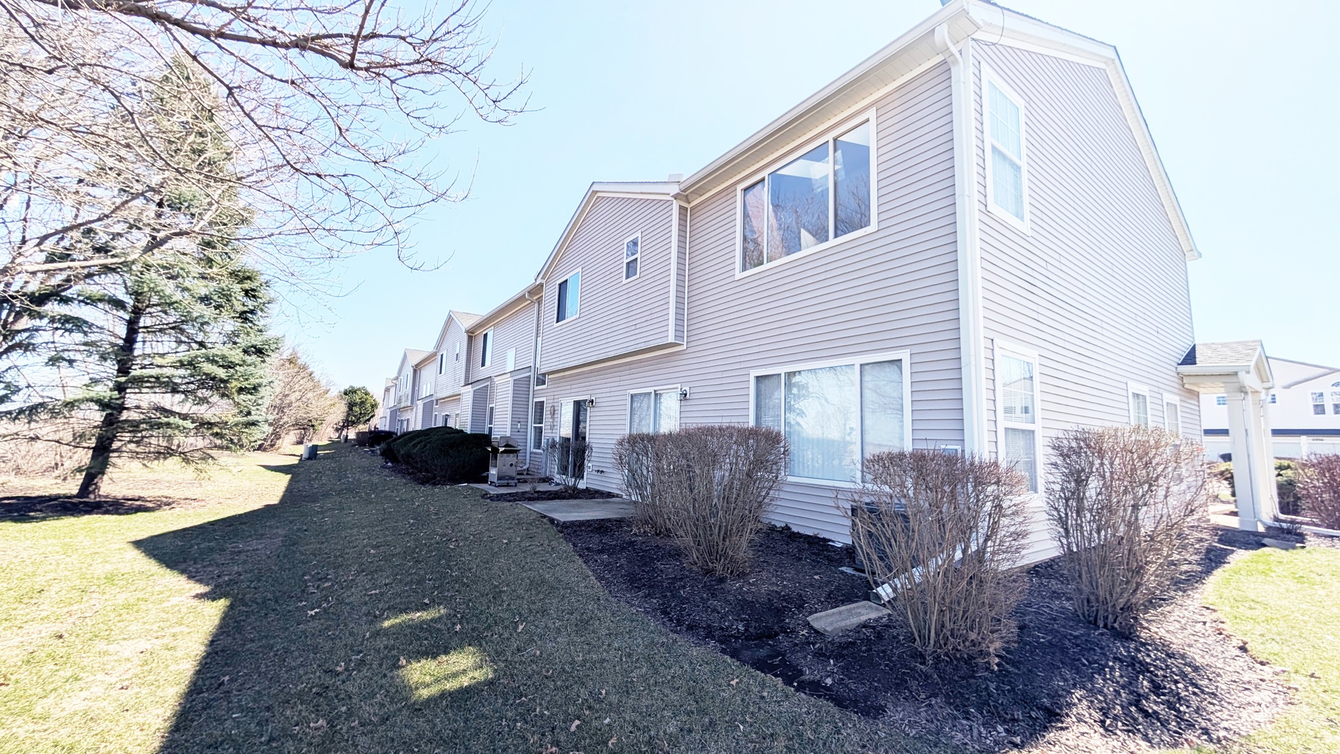6925 Clearwater Drive Plainfield, IL 60586 - Photo 2 of 2 a view of a house with backyard and sitting area
