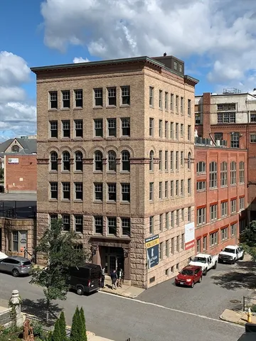 a front view of a building with street view