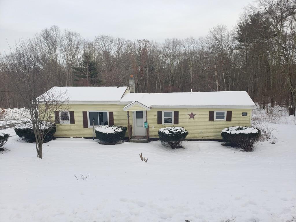59 Old Poor Farm Road Ware, MA 01082 - Photo 1 of 15 a view of a house with yard and sitting area