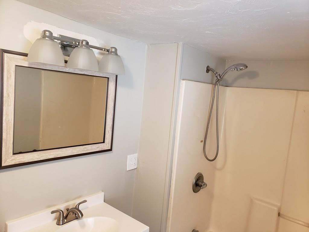 59 Old Poor Farm Road Ware, MA 01082 - Photo 11 of 15 a bathroom with a shower and a sink