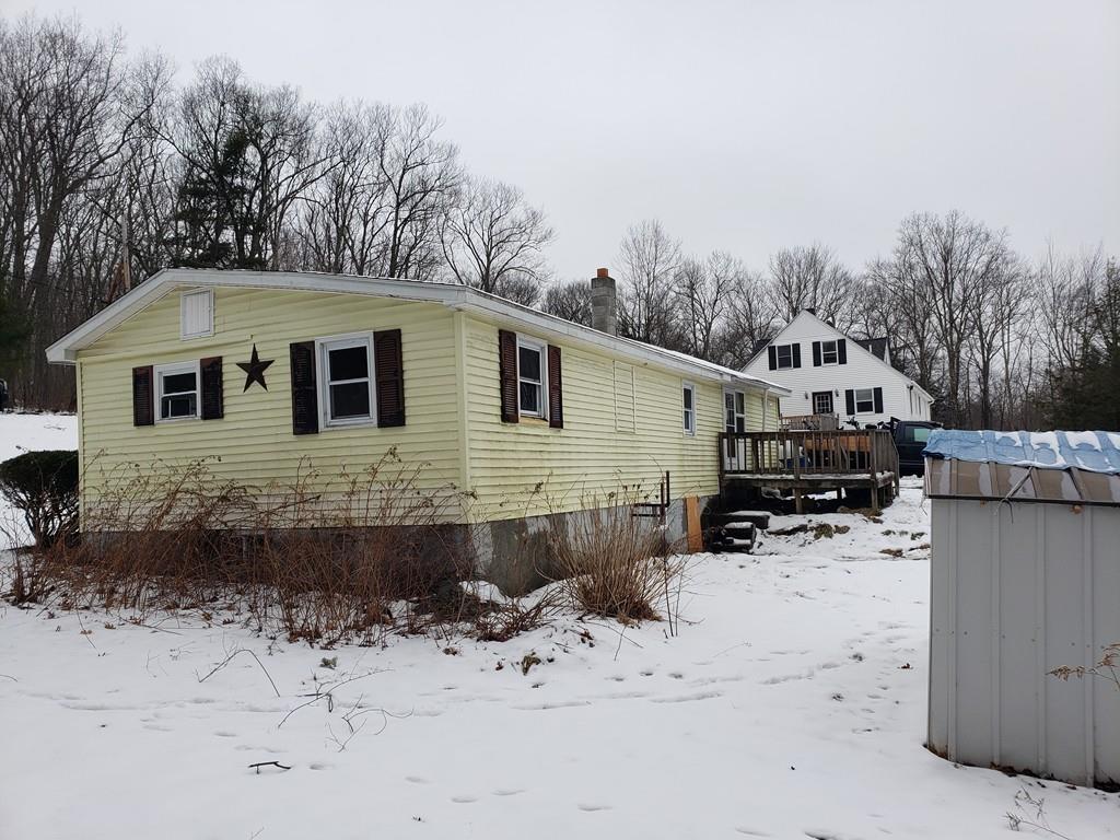 59 Old Poor Farm Road Ware, MA 01082 - Photo 3 of 15 a view of a house with snow on the background