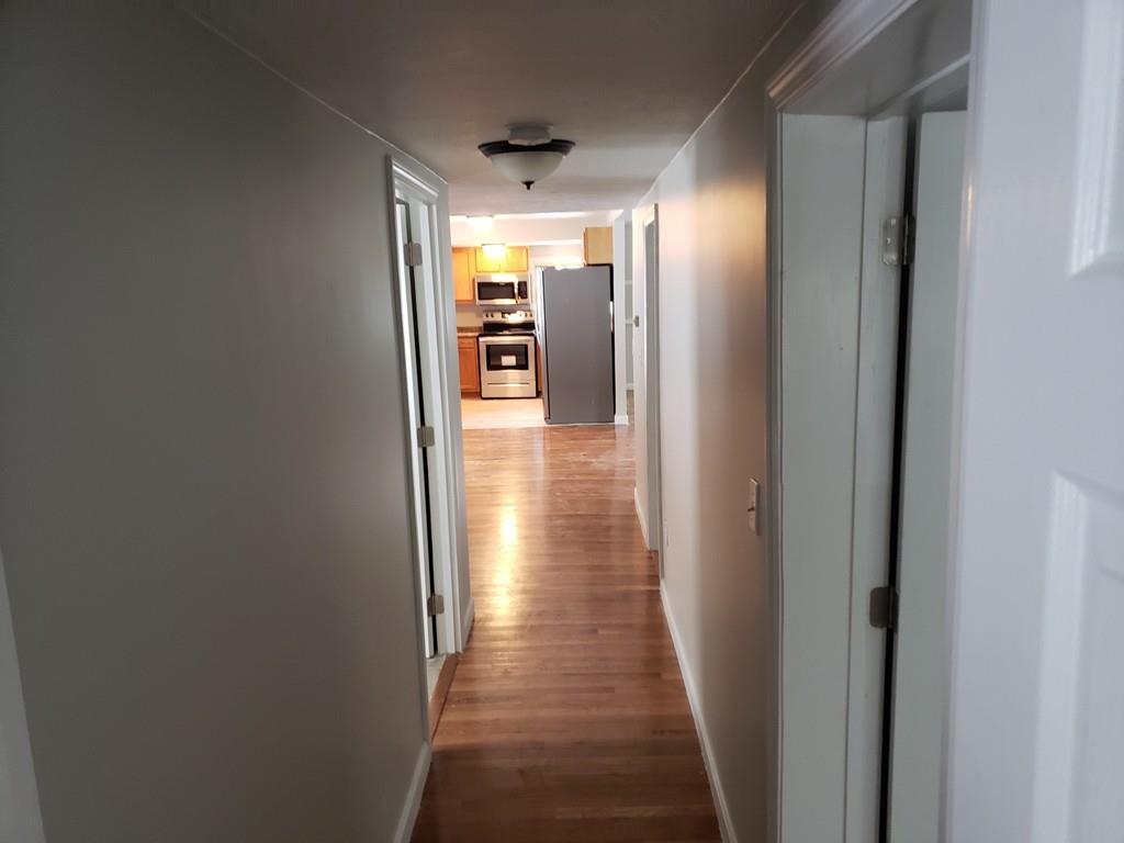 59 Old Poor Farm Road Ware, MA 01082 - Photo 7 of 15 a view of a hallway with wooden floor