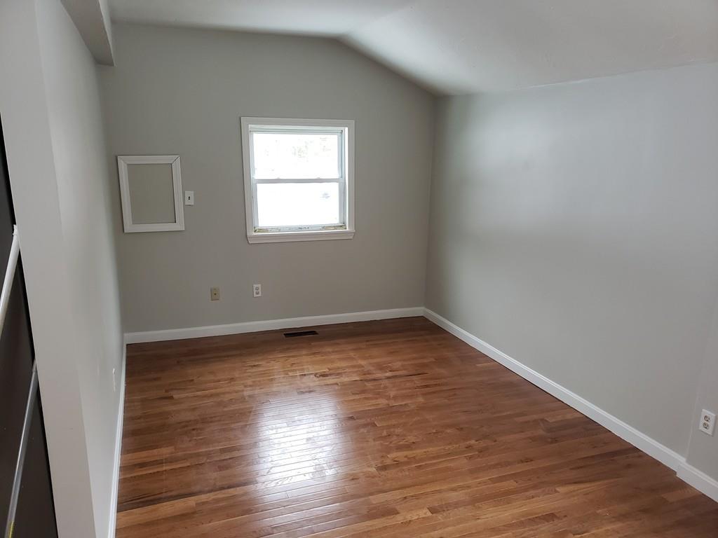 59 Old Poor Farm Road Ware, MA 01082 - Photo 10 of 15 a view of a room with wooden floor and window