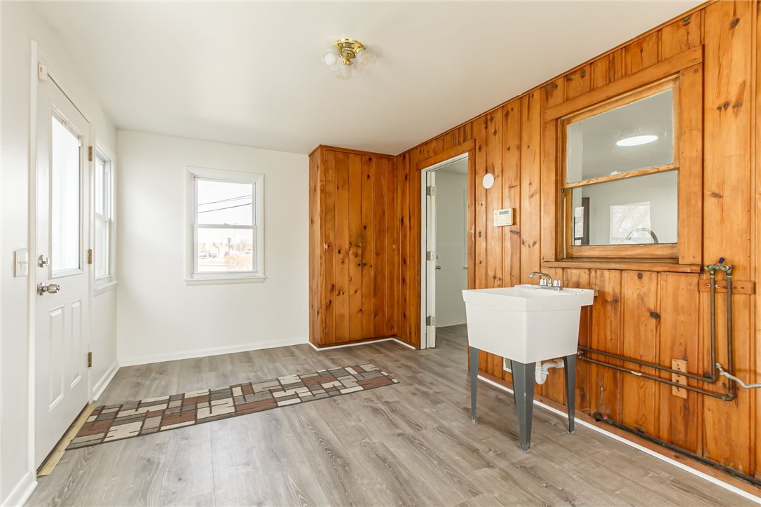 285 Waring Road Rochester, NY 14609 - Photo 8 of 24 ENTRY ROOM WITH LAUNDRY HOOKUPS AND SINK