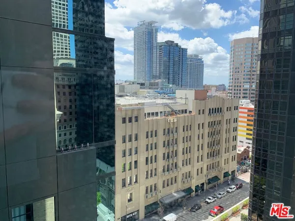 a view of a city with tall buildings