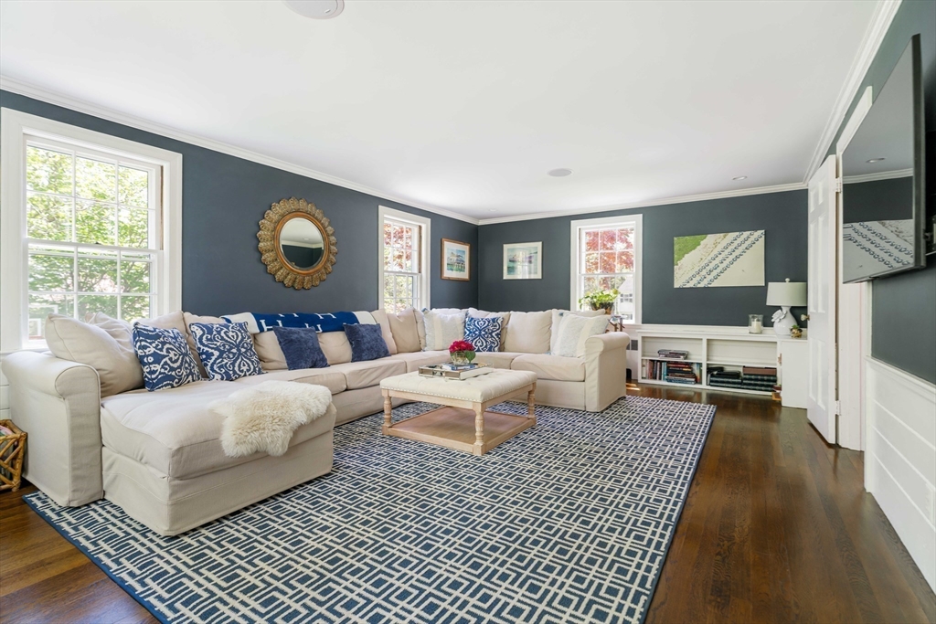81 Hampshire Road Wellesley, MA 02481 - Photo 13 of 28 a living room with furniture and a flat screen tv