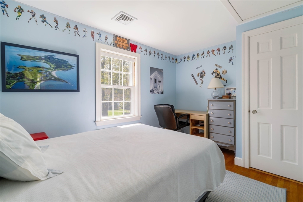 81 Hampshire Road Wellesley, MA 02481 - Photo 23 of 28 a bedroom with a bed and a window