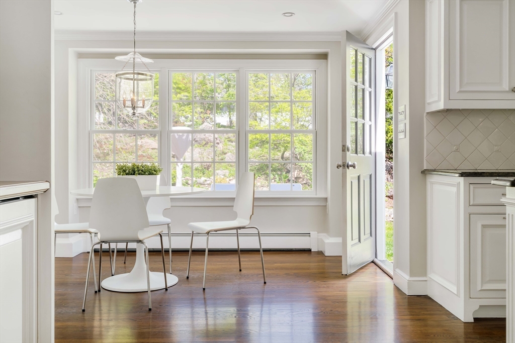81 Hampshire Road Wellesley, MA 02481 - Photo 9 of 28 a living room with furniture a window and wooden floor