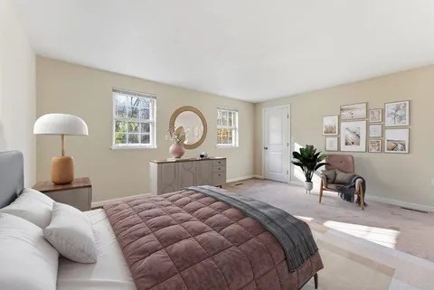 84 Fuller Street, Unit 1 Ludlow, MA 01056 - Photo 17 of 34 a bedroom with a bed chair and window