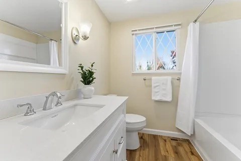 84 Fuller Street, Unit 1 Ludlow, MA 01056 - Photo 23 of 34 a bathroom with a sink and a mirror