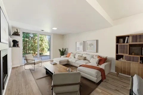 84 Fuller Street, Unit 1 Ludlow, MA 01056 - Photo 28 of 34 a living room with furniture and a large window