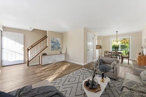 84 Fuller Street, Unit 1 Ludlow, MA 01056 - Photo 3 of 34 a living room with furniture and wooden floor