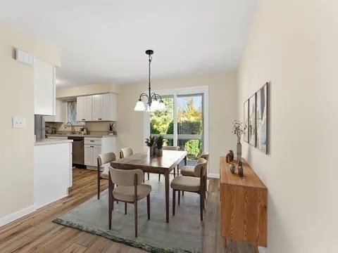 84 Fuller Street, Unit 1 Ludlow, MA 01056 - Photo 6 of 34 a view of a dining room with furniture window and outside view