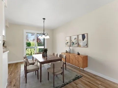 84 Fuller Street, Unit 1 Ludlow, MA 01056 - Photo 8 of 34 a dining room with furniture and window