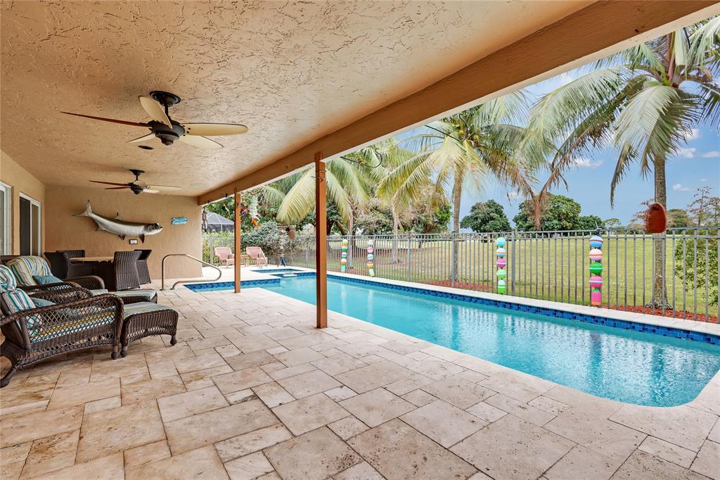 8324 Northwest 80th Street Tamarac, FL 33321 - Photo 31 of 40 a view of swimming pool with seating space