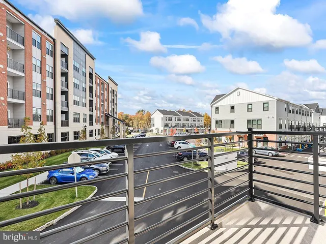 a view of a building from a balcony