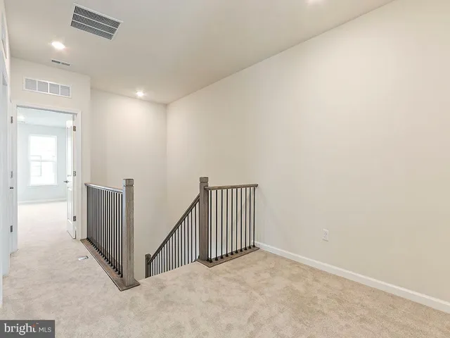 a bathroom with a double vanity sink toilet and shower