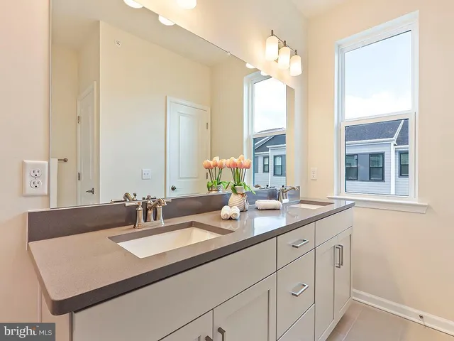 a view of a hallway with staircase