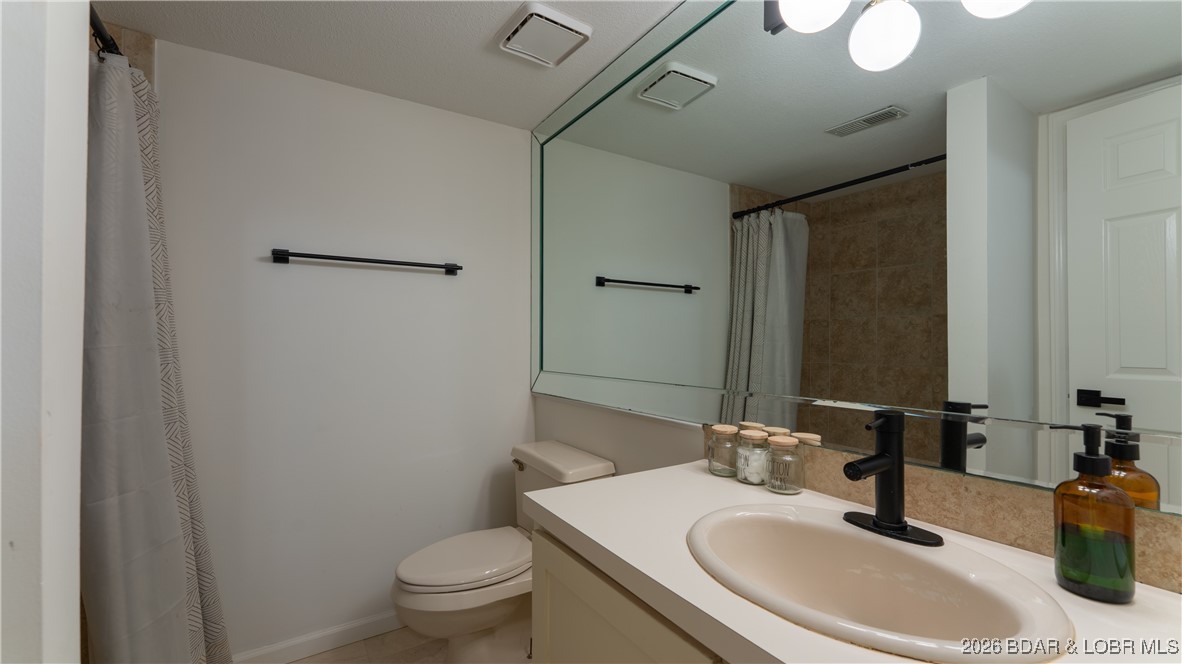 2268 Breezy Acres Road Osage Beach, MO 65065 - Photo 39 of 49 Full bath 2 in lower level