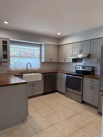 a view of a yard with an outdoor space