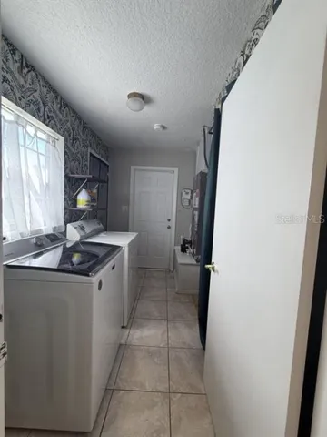 a view of a backyard with a garden