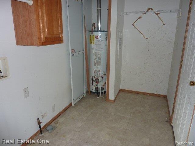 6745 Robb Road Fowlerville, MI 48836 - Photo 24 of 25 Laundry Room