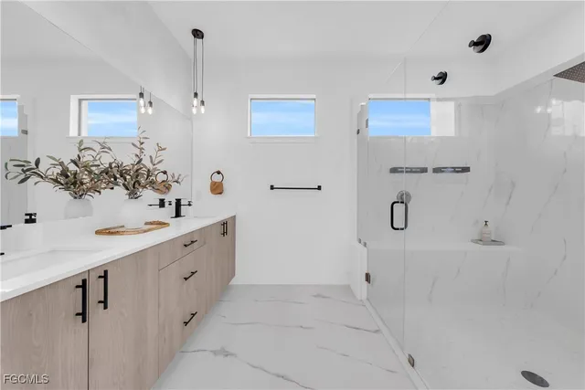 $449,900 | 2609 27th Street West, Lehigh Acres, FL 33971