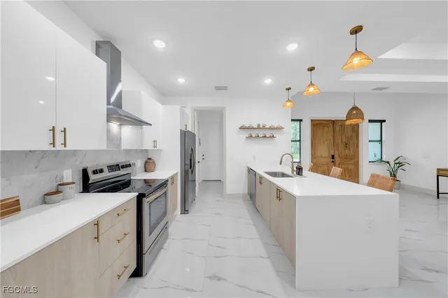 $449,900 | 2609 27th Street West, Lehigh Acres, FL 33971