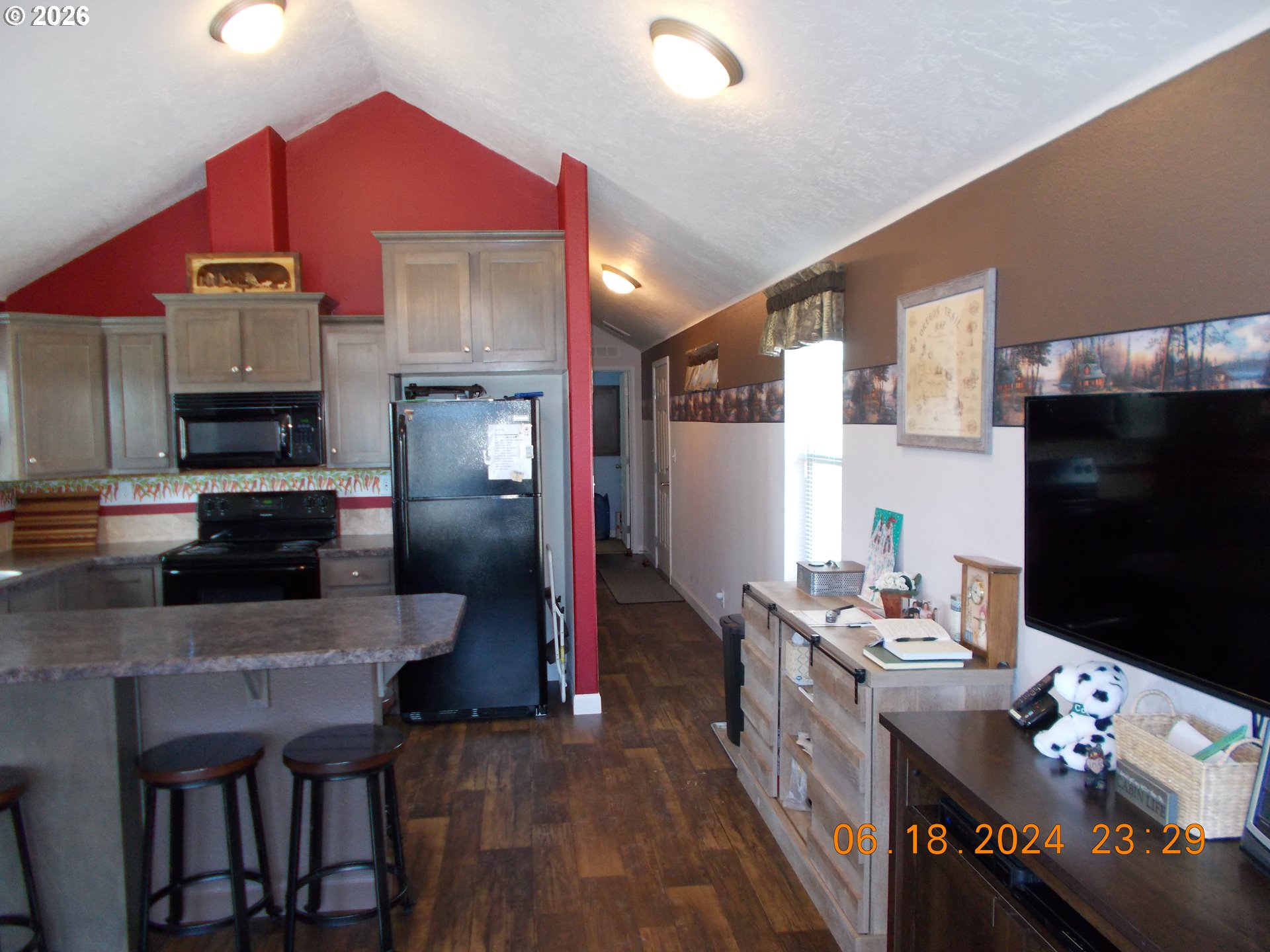 31841 Rice Road Unity, OR 97884 - Photo 24 of 27 a kitchen that has a lot of cabinets a sink and appliances