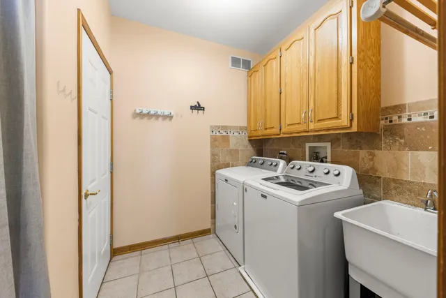 a view of utility room with washer and dryer