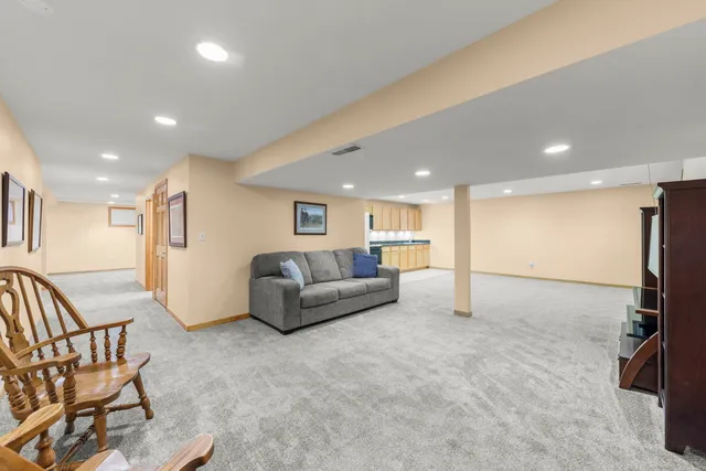 a living room with furniture and a table