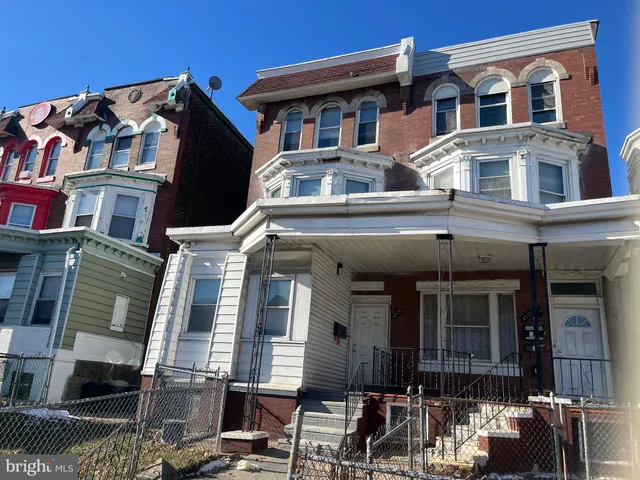 a front view of a building with balcony